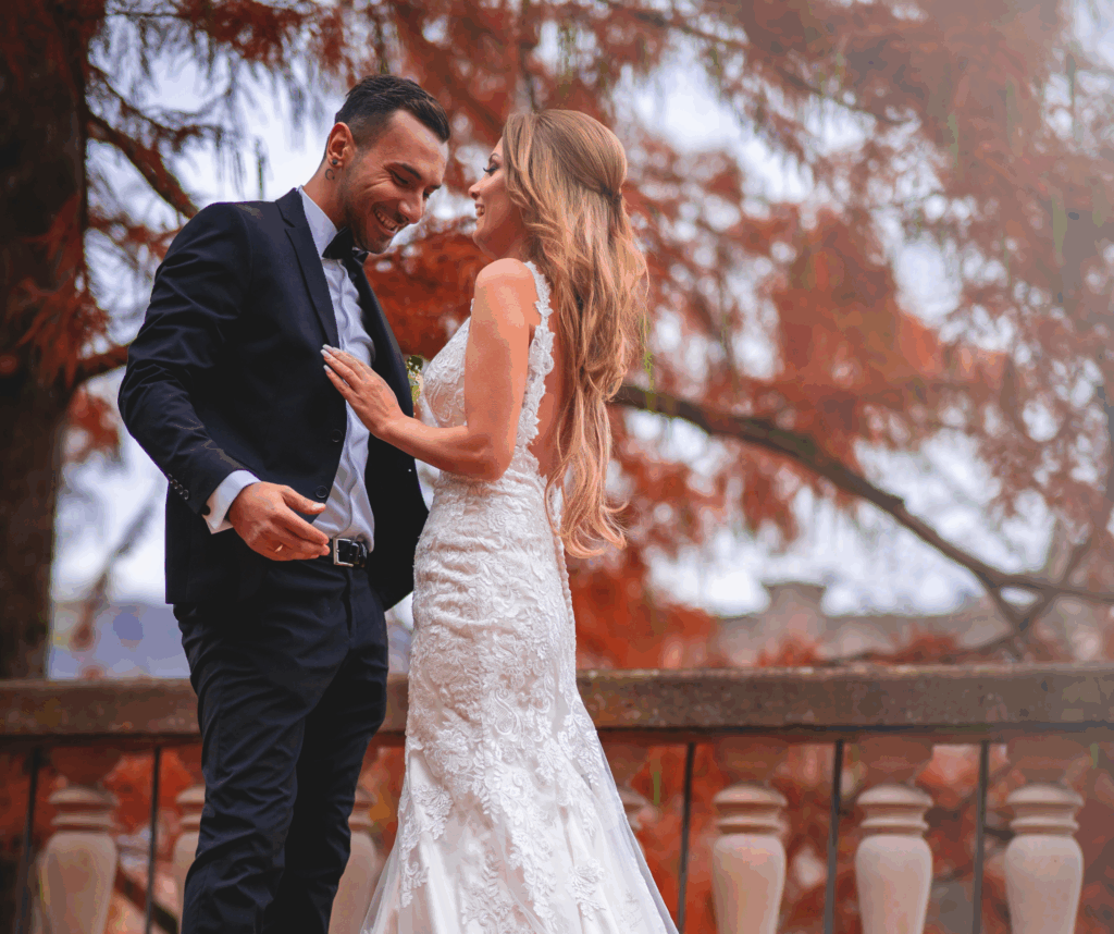 A couple on their wedding day in the Autumn leaves. This image showcases the beauty of fall in Ohio.